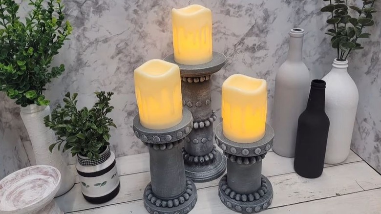 Medicine bottles turned into candle holders DIY