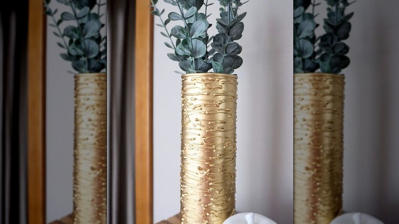 Gold vase made out of a Pringles cans