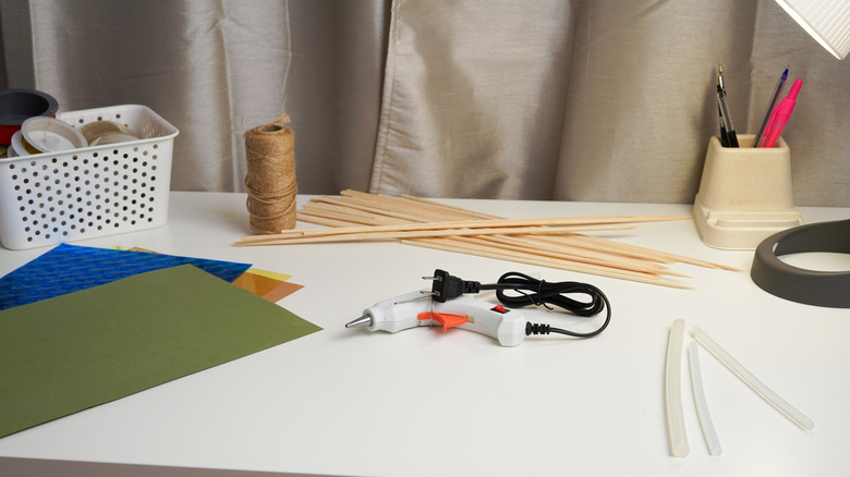 Table with various DIY materials spread out