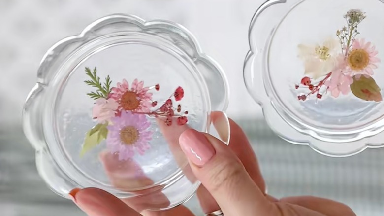 Floral shaped clear coasters with flower adornment