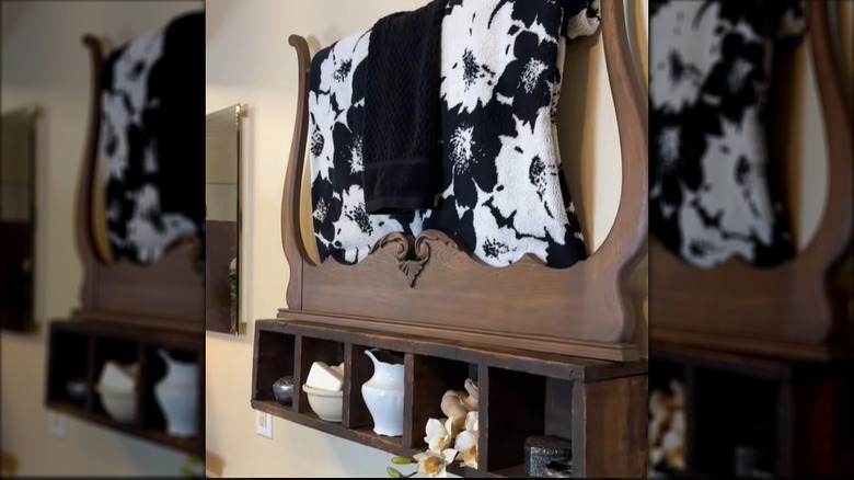 A hanging shelf made from salvaged wood and furniture pieces