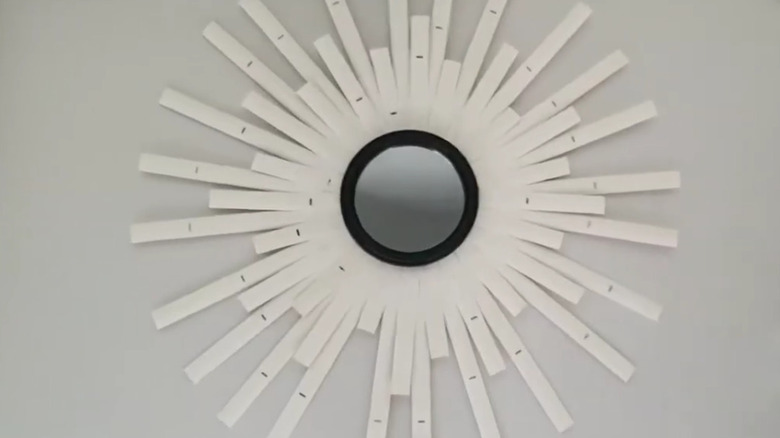 Sunburst mirror made from blinds and a Dollar Tree mirror