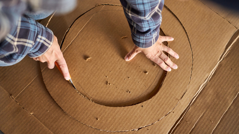 Cutting a hoop out of cardboard