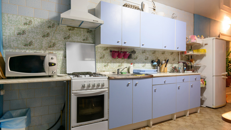 An outdated kitchen needs a facelift.