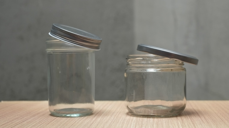 Two empty mason jar lids