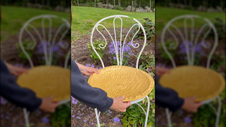Creator adding tray to metal chair frame