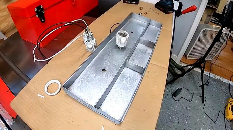 A light fitting added to a toolbox tray