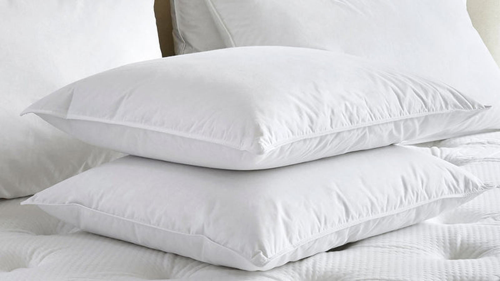 Transform an Unused Bed Pillow into Two Stylish Accent Pillows with This DIY Guide