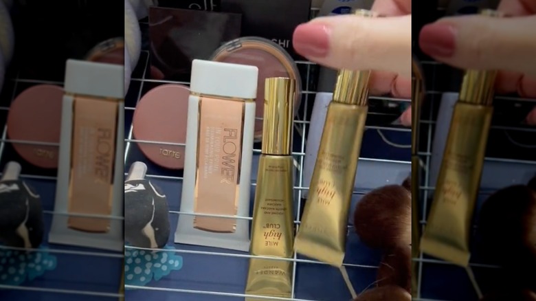 screenshot that shows person using over rack to organize makeup
