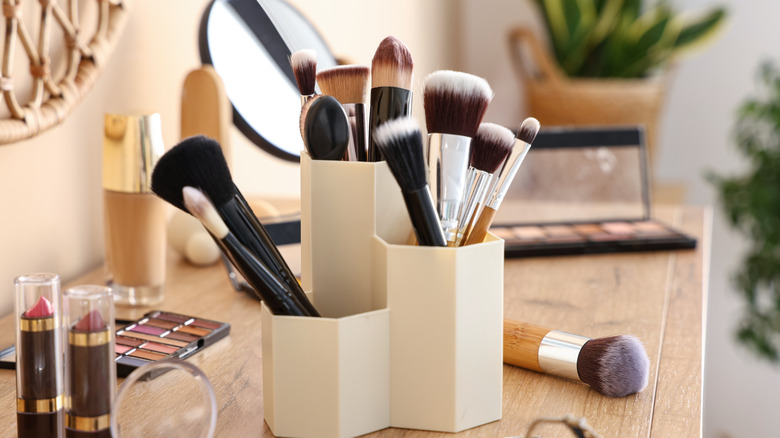 disorganized makeup on a counter