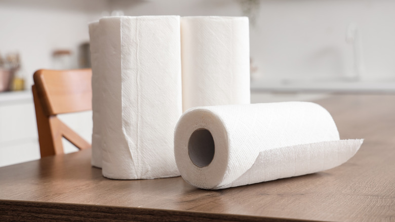 Paper towels on a kitchen table.