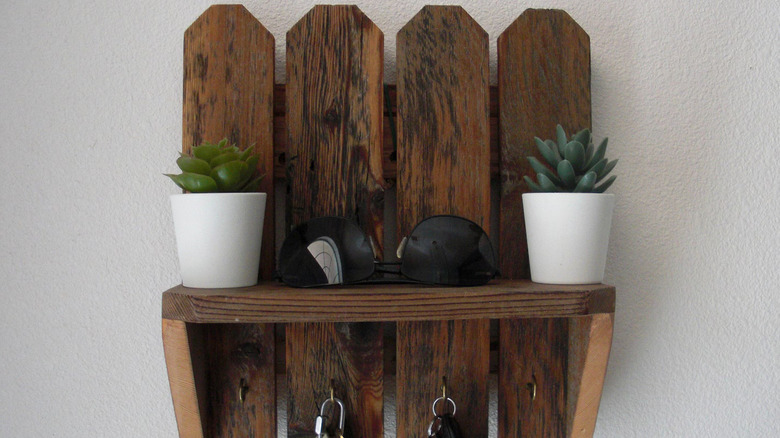 An entryway key organizer made from scrap wood