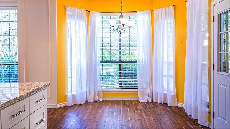 Empty breakfast nook with windows