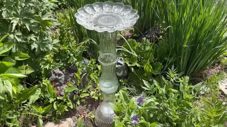 A DIY birdbath made out of thrifted glass vases