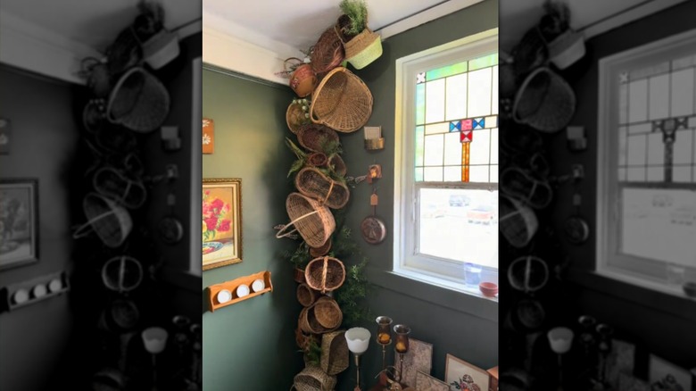 A floor-to-ceiling arch made from pool noodles and wicker baskets