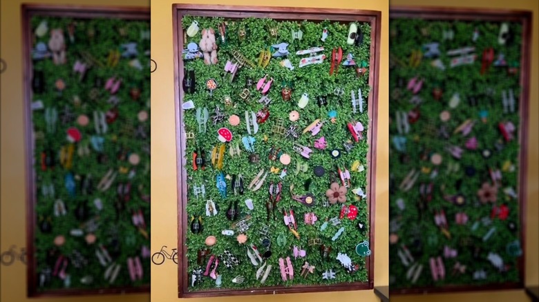 Claw clips attached to grass wall