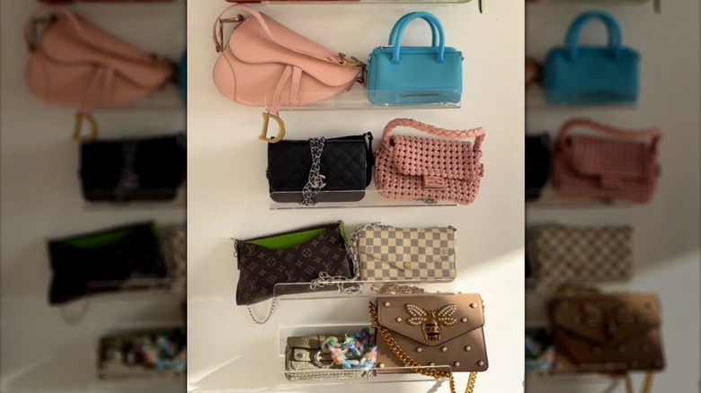 Purse wall made with multiple acrylic shelves, each holding 2 purses