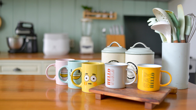 Mugs sitting on kitchen counter