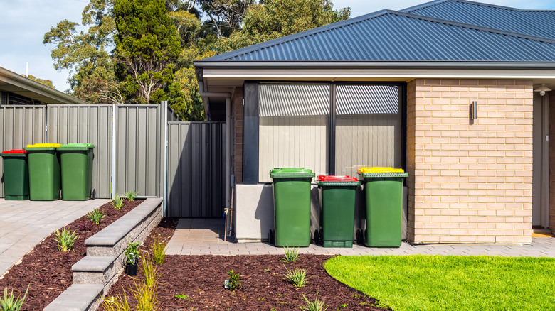Garbage bins placed outside someone's home