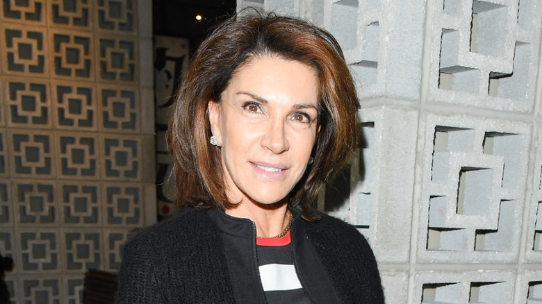 Hilary Farr smiling at an event