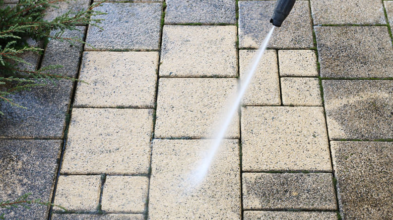Water emitted from pressure washer