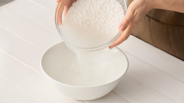Woman making rice water