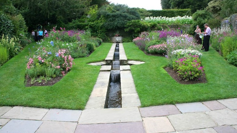 A symmetrical water rill channel running in a yard