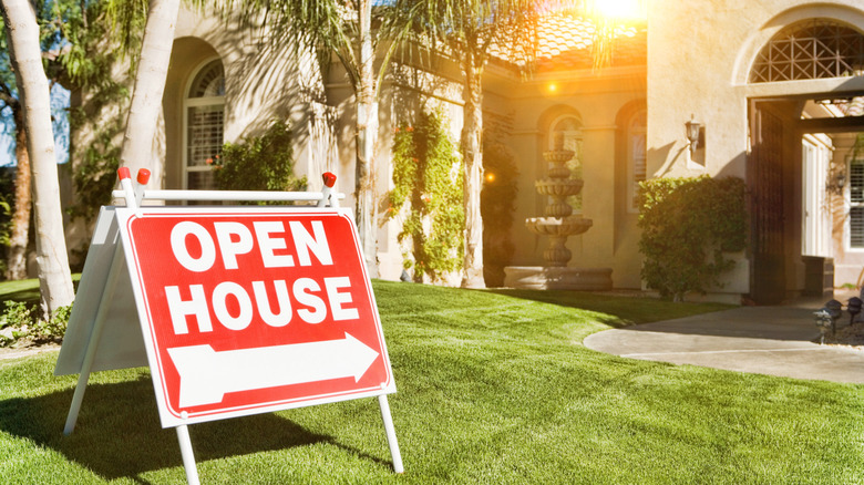 Open house sign and house