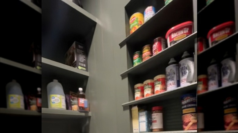 Recessed pantry niche with jars of food