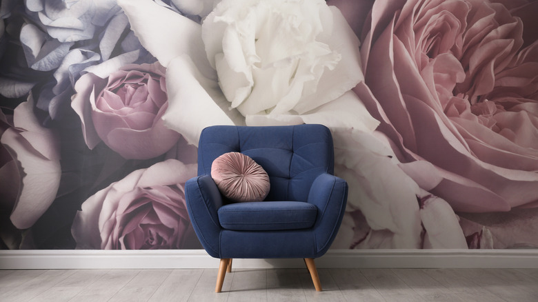 Flowery wallpaper and chair