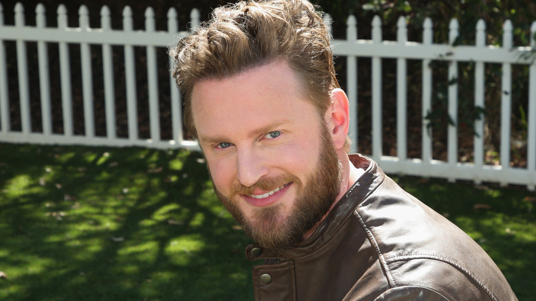 Bobby Berk smiling outside