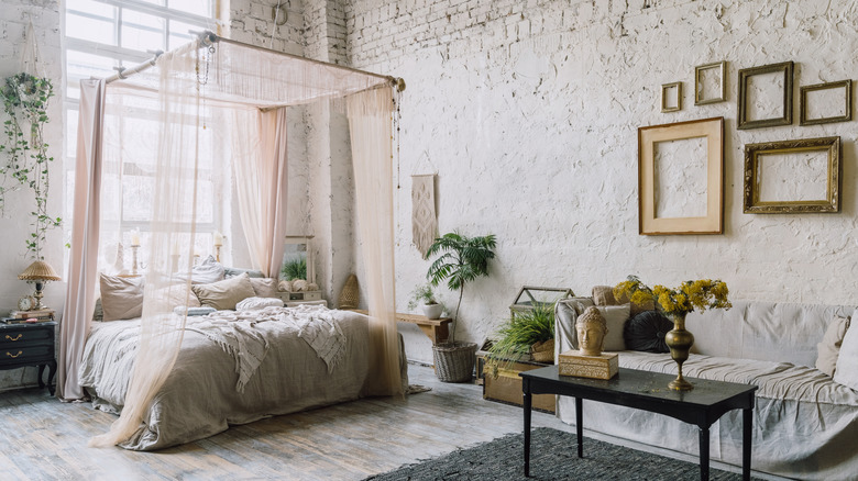 Bed with gauzy canopy