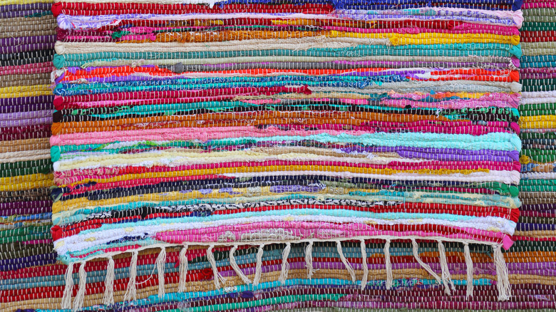 Colorful rag rug with fringe