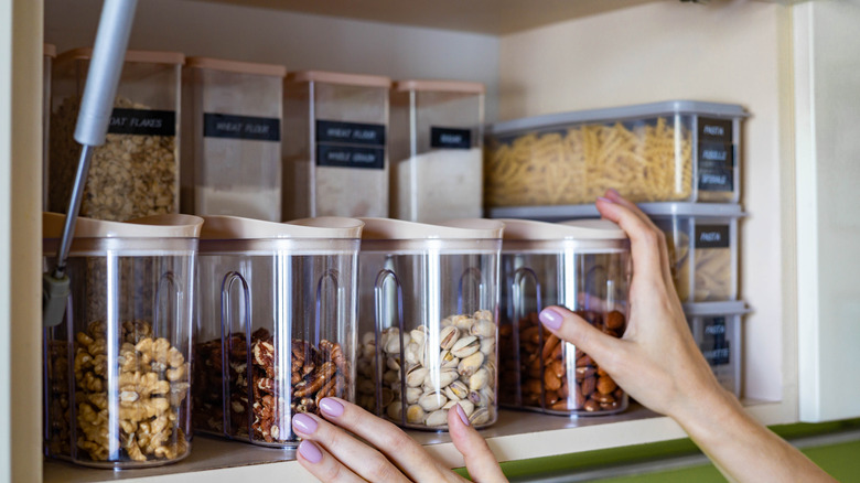 Dry goods organized and stored in clear containers