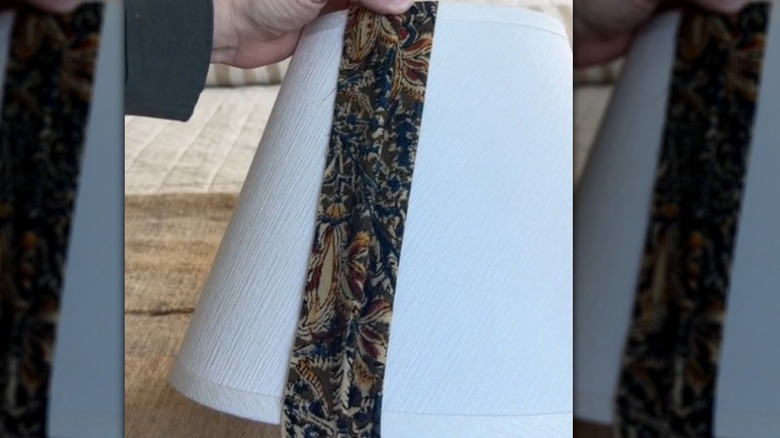 Wrapping fabric strip over a lampshade for a pleated look