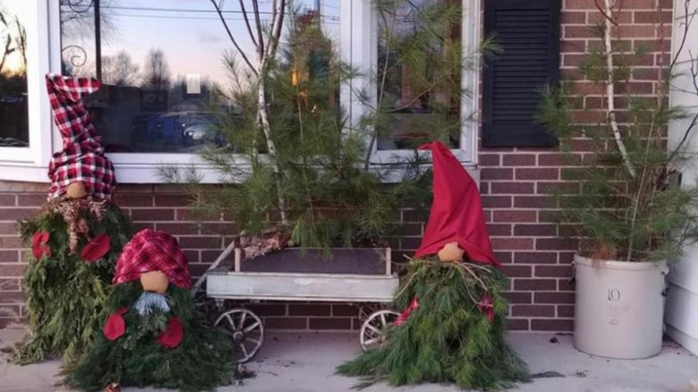 Christmas gnomes made from tomato cages.