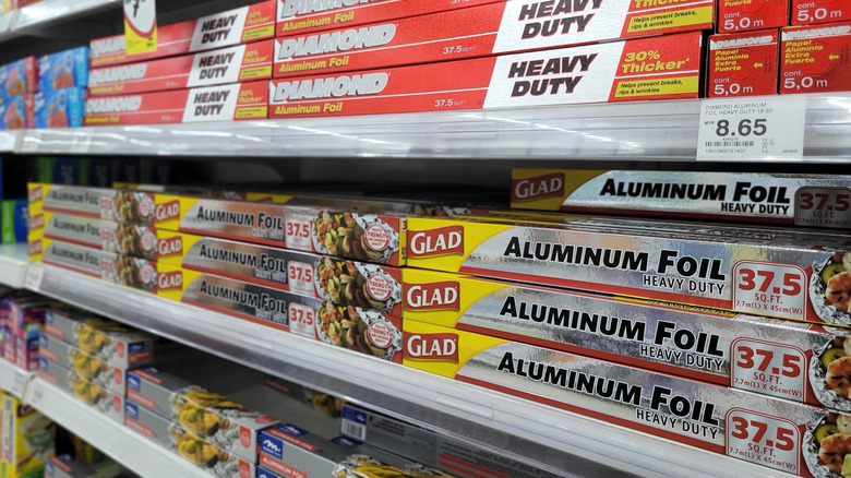 Boxes of aluminum foil on grocery store shelves