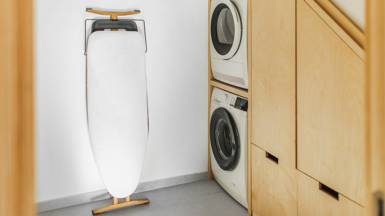 Ironing board in laundry room