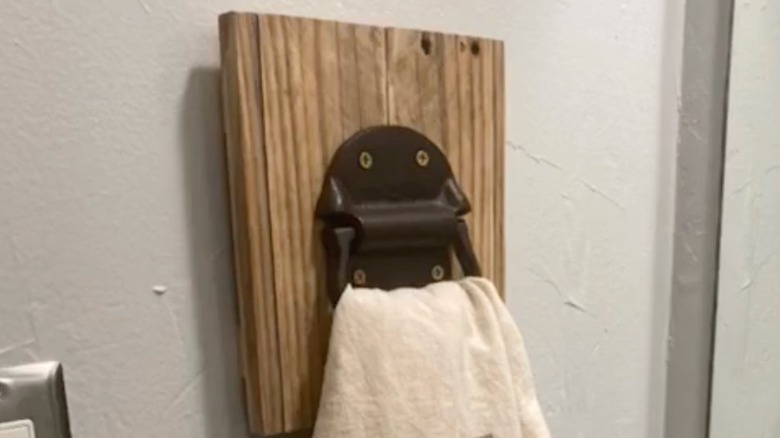 drawer hardware used as a towel holder