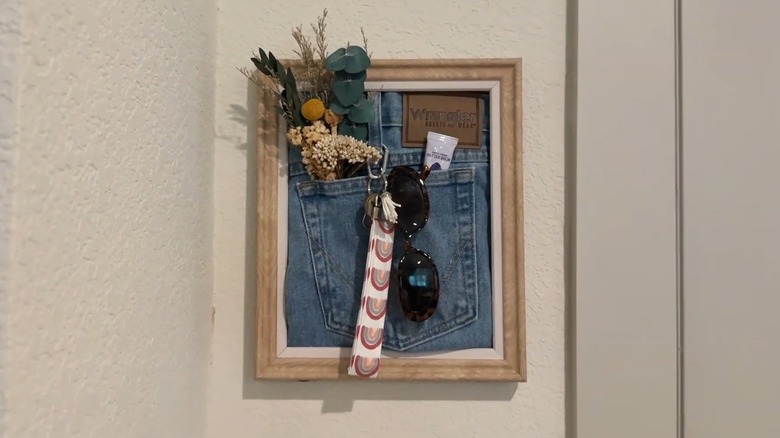 Jeans key holder frame mounted on wall