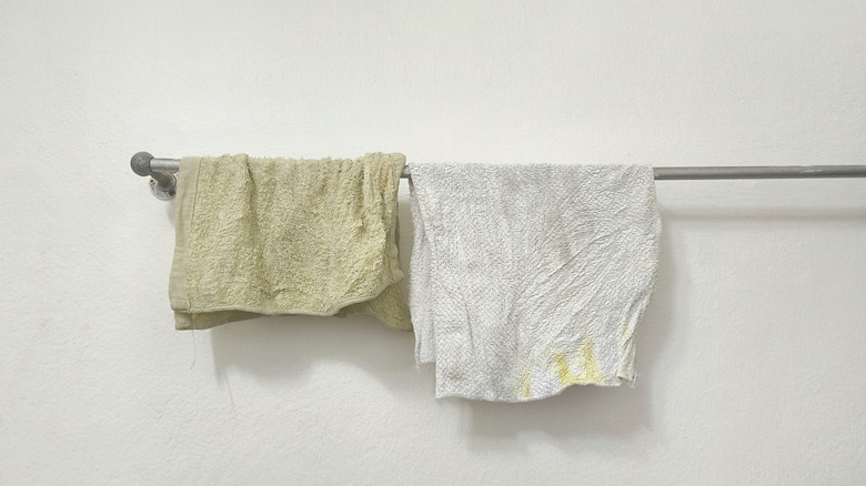 old rags on a towel hanger