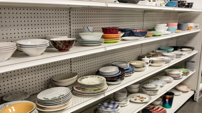 thrift store dishes on shelves