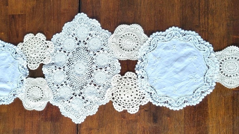 DIY table centerpiece made from thrifted vintage doilies