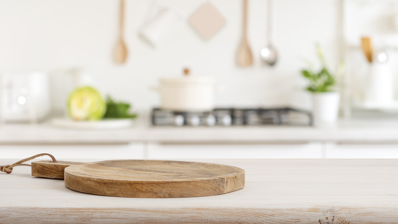 Clean cheese board on a kitchen countertop
