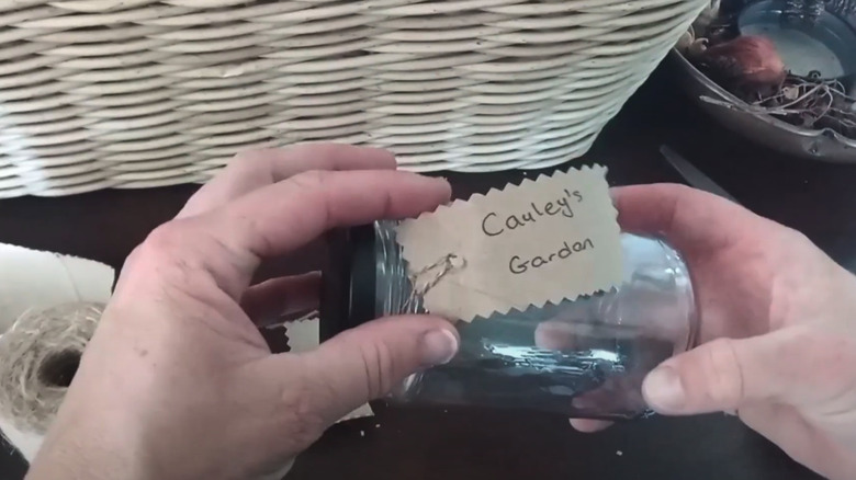 Jars with seeds and cardboard labels