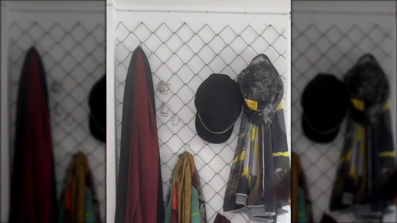 Accessories hanging on DIY chain link accessory wall