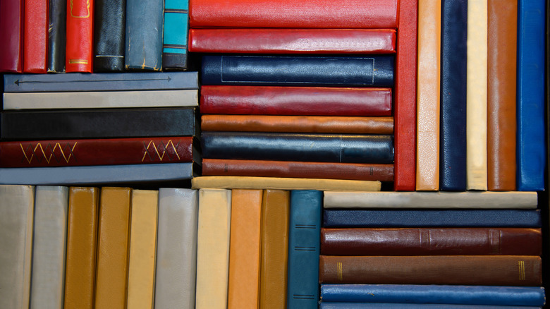 Assorted books stacked together