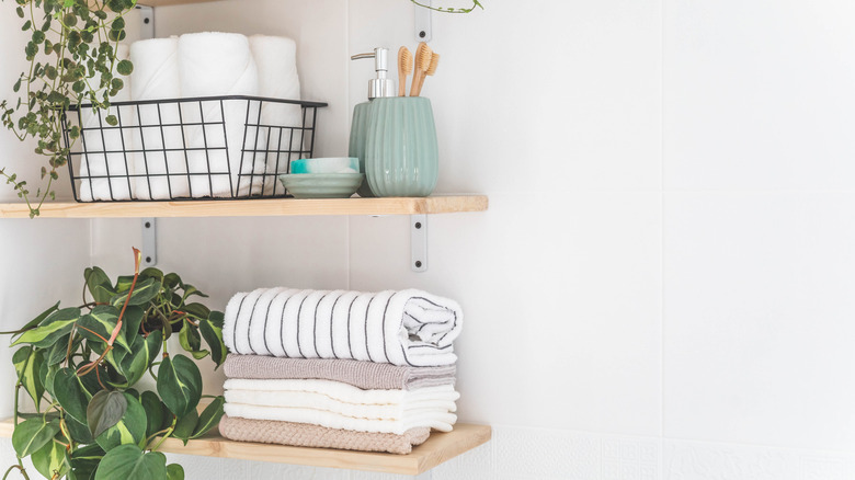 Open shelving inside a bathroom.