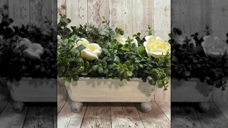 A planter box made from a bread pan