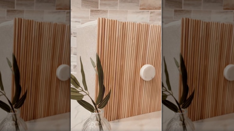 Fluted accent across front of storage cube.